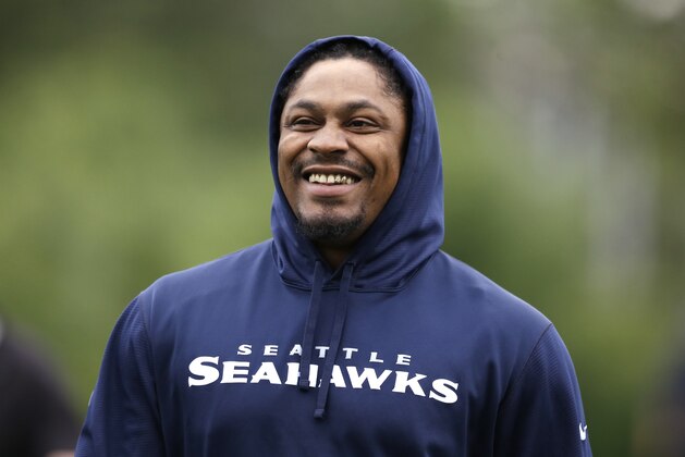 Seattle Seahawks' Marshawn Lynch walks off the field following a football minicamp practice that he watched from the sidelines Tuesday, June 17, 2014, in Renton, Wash. (AP Photo/Elaine Thompson) Seattle Seahawks' Marshawn Lynch walks off the field following a football minicamp practice that he watched from the sidelines Tuesday, June 17, 2014, in Renton, Wash. (AP Photo/Elaine Thompson)