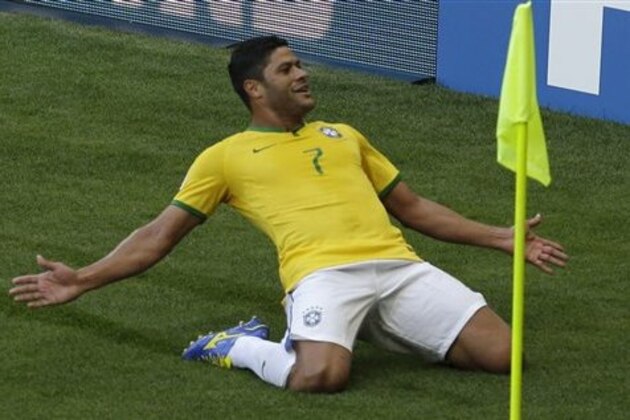 CORRECTS ID TO HULK _ Brazil's Hulk celebrates before his goal was disallowed due to a handball during the World Cup round of 16 soccer match between Brazil and Chile at the Mineirao Stadium in Belo Horizonte, Brazil, Saturday, June 28, 2014. (AP Photo/Hassan Ammar)