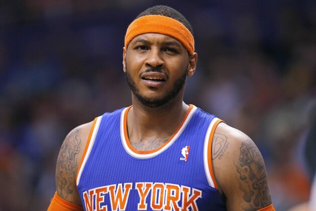 New York Knicks' Carmelo Anthony reacts to an official's call during the second half of an NBA basketball game against the Phoenix Suns, Friday, March 28, 2014, in Phoenix. The Suns won 112-88. (AP Photo/Matt York) New York Knicks' Carmelo Anthony reacts to an official's call during the second half of an NBA basketball game against the Phoenix Suns, Friday, March 28, 2014, in Phoenix. The Suns won 112-88. (AP Photo/Matt York)
