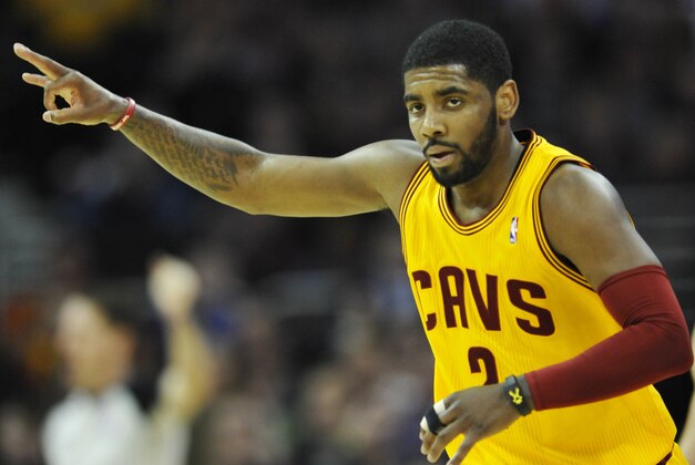 Apr 5, 2014; Cleveland, OH, USA; Cleveland Cavaliers guard Kyrie Irving (2) celebrates a three-point basket in the first quarter against the Charlotte Bobcats at Quicken Loans Arena. Mandatory Credit: David Richard-USA TODAY Sports Apr 5, 2014; Cleveland, OH, USA; Cleveland Cavaliers guard Kyrie Irving (2) celebrates a three-point basket in the first quarter against the Charlotte Bobcats at Quicken Loans Arena. Mandatory Credit: David Richard-USA TODAY Sports
