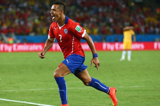 CUIABA, BRAZIL - JUNE 13:  Alexis Sanchez of Chile celebrates after scoring his team's first goal during the 2014 FIFA World Cup Brazil Group B match between Chile and Australia at Arena Pantanal on June 13, 2014 in Cuiaba, Brazil.  (Photo by Cameron Spencer/Getty Images)