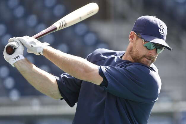 San Diego Padres third baseman Chase Headley rehearses his swing during batting practice prior to a baseball game against the Cincinnati Reds Monday, June 30, 2014, in San Diego.  (AP Photo/Lenny Ignelzi)