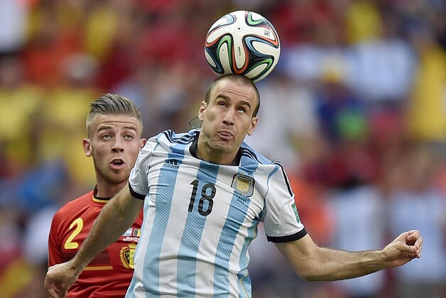 Argentina's Rodrigo Palacio wins a header during the World Cup quarterfinal soccer match between Argentina and Belgium at the Estadio Nacional in Brasilia, Brazil, Saturday, July 5, 2014. (AP Photo/Martin Meissner) Argentina's Rodrigo Palacio wins a header during the World Cup quarterfinal soccer match between Argentina and Belgium at the Estadio Nacional in Brasilia, Brazil, Saturday, July 5, 2014. (AP Photo/Martin Meissner)