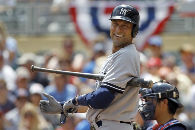 New York Yankees'  Derek Jeter looks to third base coach Rob Thomson during the first inning of a baseball game against the Minnesota Twins in Minneapolis, Sunday, July 6, 2014. (AP Photo/Ann Heisenfelt)