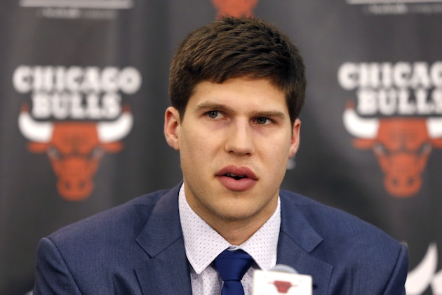 Basketball player Doug McDermott responds to a question as the Chicago Bulls first round NBA draft pick during a news conference Monday, June 30, 2014, in Deerfield, Ill. (AP Photo/Charles Rex Arbogast)