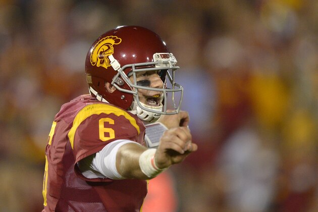 Southern California quarterback Cody Kessler gestures during the first half of an NCAA college football game against UCLA, Saturday, Nov. 30, 2013, in Los Angeles. (AP Photo/Mark J. Terrill)