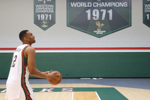 ST. FRANCIS, WI - JUNE 28:  Jabari Parker #12 of the Milwaukee Bucks poses for a portrait at the Bucks Training Center on June 28, 2014 in St. Francis, Wisconsin. NOTE TO USER:  User expressly acknowledges and agrees that, by downloading and or using this Photograph, user is consenting to the terms and conditions of the Getty Images License Agreement.  Mandatory Copyright Notice:  Copyright 2014 NBAE (Photo by Jeffrey Phelps/NBAE via Getty Images)