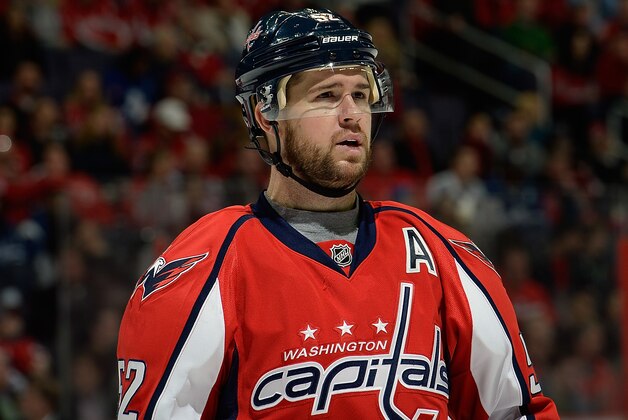 WASHINGTON, DC - MARCH 16:  Mike Green #52 of the Washington Capitals reacts in between plays in the first period during an NHL game against the Toronto Maple Leafs at Verizon Center on March 16, 2014 in Washington, DC.  (Photo by Patrick McDermott/NHLI via Getty Images)