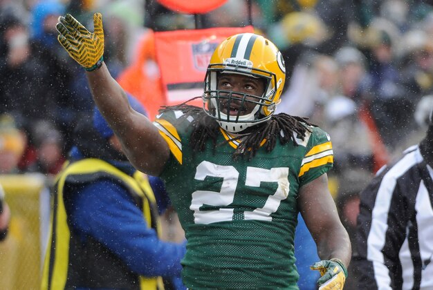 Dec 8, 2013; Green Bay, WI, USA;  Green Bay Packers running back Eddie Lacy (27) reacts after getting a first down in the 1st quarter during the game against the Atlanta Falcons at Lambeau Field. Mandatory Credit: Benny Sieu-USA TODAY Sports