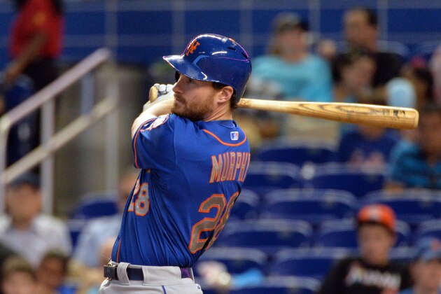 Jun 22, 2014; Miami, FL, USA; New York Mets second baseman Daniel Murphy (28) connects for a base hit during the third inning against the Miami Marlins at Marlins Ballpark. Mandatory Credit: Steve Mitchell-USA TODAY Sports
