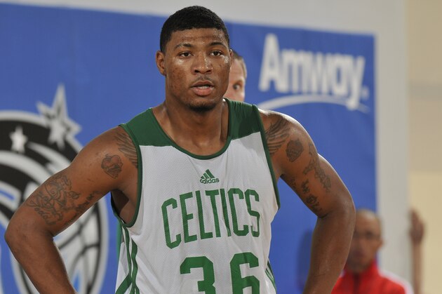 ORLANDO, FL - JULY 7:  Marcus Smart #36 of the Boston Celtics looks on against the Indiana Pacers during the game on July 7, 2014 at Amway Center in Orlando, Florida. NOTE TO USER: User expressly acknowledges and agrees that, by downloading and or using this photograph, User is consenting to the terms and conditions of the Getty Images License Agreement. Mandatory Copyright Notice: Copyright 2014 NBAE  (Photo by Fernando Medina/NBAE via Getty Images)
