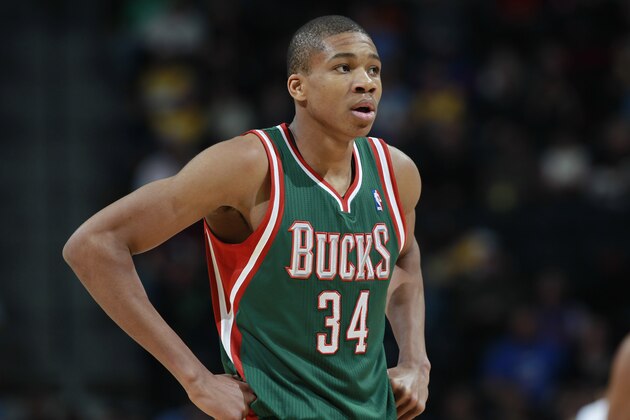 Milwaukee Bucks forward Giannis Antetokounmpo, of Greece, looks on against the Denver Nuggets in the third quarter of the Nuggets' 110-100 victory in an NBA basketball game in Denver on Wednesday, Feb. 5, 2014. (AP Photo/David Zalubowski)