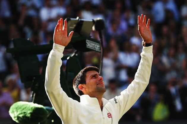 LONDON, ENGLAND - JULY 06:  Novak Djokovic of Serbia in tears as he celebrates after winning the Gentlemen's Singles Final match against Roger Federer of Switzerland on day thirteen of the Wimbledon Lawn Tennis Championships at the All England Lawn Tennis and Croquet Club on July 6, 2014 in London, England.  (Photo by Matthew Stockman/Getty Images)