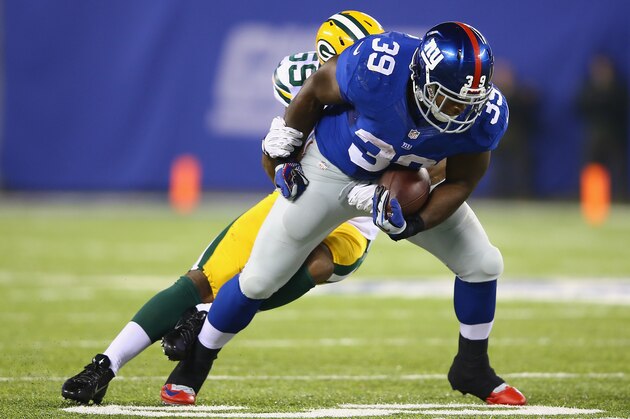 EAST RUTHERFORD, NJ - NOVEMBER 17:   John Conner #39 of the New York Giants in action against the Green Bay Packers during their game at MetLife Stadium on November 17, 2013 in East Rutherford, New Jersey.  (Photo by Al Bello/Getty Images)