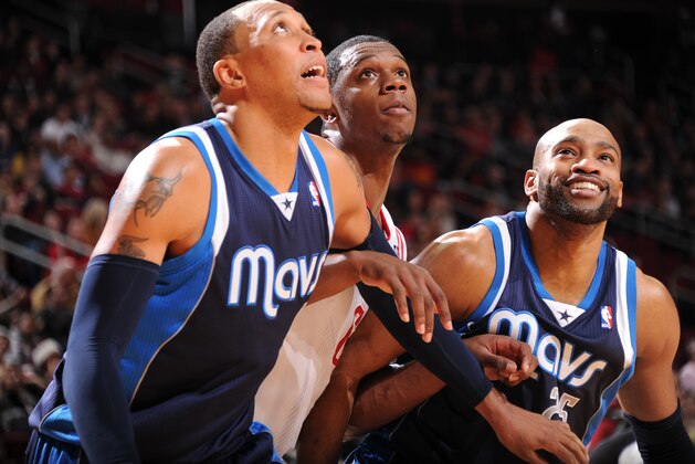 HOUSTON, TX - DECEMBER 23:  Terrence Jones #6 of the Houston Rockets and Shawn Marion #0 and Vince Carter #25 of the Dallas Mavericks battle for the rebound on December 23, 2013 at the Toyota Center in Houston, Texas. NOTE TO USER: User expressly acknowledges and agrees that, by downloading and or using this photograph, User is consenting to the terms and conditions of the Getty Images License Agreement. Mandatory Copyright Notice: Copyright 2013 NBAE (Photo by Bill Baptist/NBAE via Getty Images)