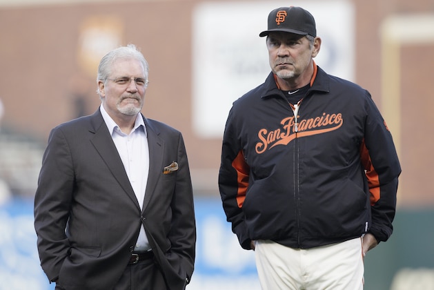 San Francisco Giants general manager Brian Sabean, left, and manager Bruce Bochy before a baseball game against the Cincinnati Reds in San Francisco, Thursday, June 9, 2011. (AP Photo/Jeff Chiu)