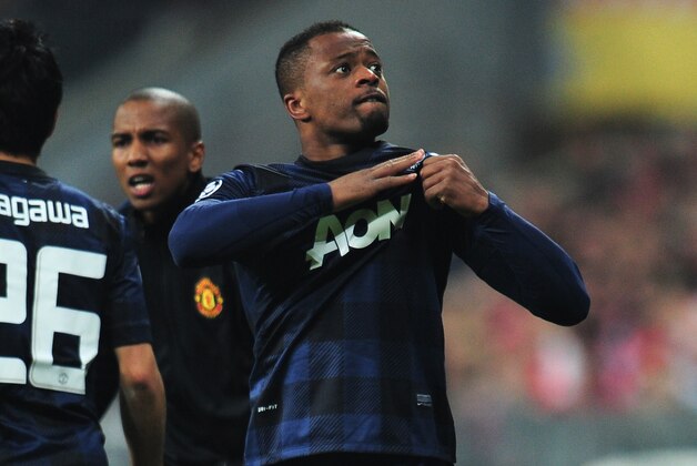 MUNICH, GERMANY - APRIL 09: Patrice Evra of Manchester United celebrates his goal during the UEFA Champions League Quarter Final second leg match between FC Bayern Muenchen and Manchester United at Allianz Arena on April 9, 2014 in Munich, Germany. (Photo by Shaun Botterill/Getty Images) MUNICH, GERMANY - APRIL 09: Patrice Evra of Manchester United celebrates his goal during the UEFA Champions League Quarter Final second leg match between FC Bayern Muenchen and Manchester United at Allianz Arena on April 9, 2014 in Munich, Germany. (Photo by Shaun Botterill/Getty Images)
