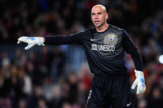 BARCELONA, SPAIN - JANUARY 26:  Willy Caballero of Malaga CF looks on during the La Liga match between FC Barcelona and Malaga CF at Camp Nou on January 26, 2014 in Barcelona, Spain.  (Photo by David Ramos/Getty Images)