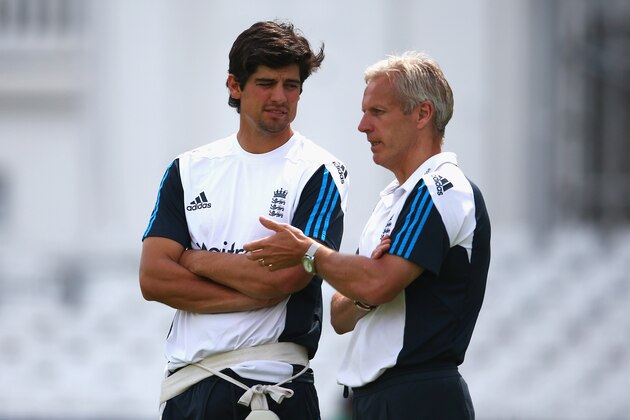 NOTTINGHAM, ENGLAND - JULY 08:  Alastair Cook, captain of England talks to Peter Moores, Coach of England during an England nets session ahead of the first Investec Test Series at Trent Bridge on July 8, 2014 in Nottingham, England.  (Photo by Matthew Lewis/Getty Images)
