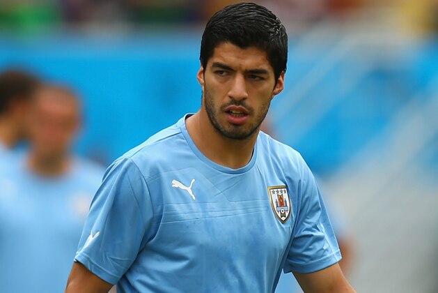 NATAL, BRAZIL - JUNE 24:  Luis Suarez of Uruguay warms up ahead of the 2014 FIFA World Cup Brazil Group D match between Italy and Uruguay at Estadio das Dunas on June 24, 2014 in Natal, Brazil.  (Photo by Clive Rose/Getty Images)