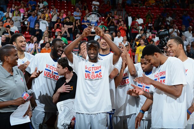 LAS VEGAS, NV - JULY 22: Ian Clark #21 of the Golden State Warriors holds his MVP Trophy after the game against the Phoenix Suns during NBA Summer League Championship Game on July 22, 2013 at the Cox Pavilion in Las Vegas, Nevada. NOTE TO USER: User expressly acknowledges and agrees that, by downloading and/or using this Photograph, user is consenting to the terms and conditions of the Getty Images License Agreement. Mandatory Copyright Notice: Copyright 2013 NBAE (Photo by Garrett W. Ellwood/NBAE via Getty Images)