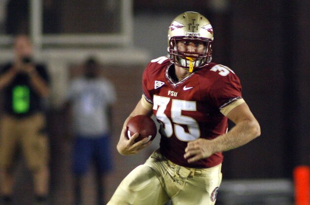 Florida State tight end Nick O'Leary (35) gets 15 yards after catching a pass against Clemson in the first quarter of an NCAA college football game on Saturday, Sept. 22, 2012, in Tallahassee, Fla. Florida State won 49-37. (AP Photo/Phil Sears)