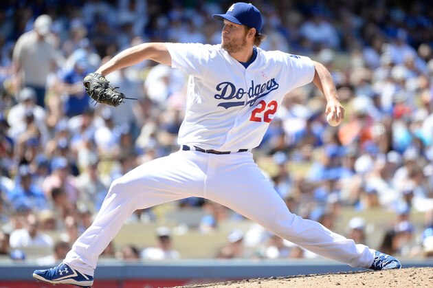 LOS ANGELES, CA - MAY 11:  Clayton Kershaw #22 of the Los Angeles Dodgers pitches against the San Francisco Giants during the sixth inning at Dodger Stadium on May 11, 2014 in Los Angeles, California.  (Photo by Harry How/Getty Images)