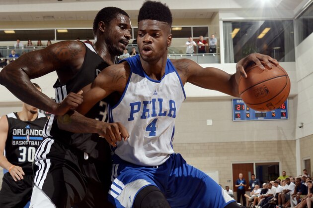 ORLANDO, FL - JULY 5: Nerlens Noel #4 of the Philadelphia 76ers handles the ball against the Orlando Magic on July 5, 2014 at Amway Center in Orlando, Florida. NOTE TO USER: User expressly acknowledges and agrees that, by downloading and or using this photograph, User is consenting to the terms and conditions of the Getty Images License Agreement. Mandatory Copyright Notice: Copyright 2014 NBAE  (Photo by Fernando Medina/NBAE via Getty Images)