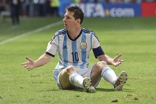 Argentina's Lionel Messi appeals for a foul during the World Cup quarterfinal soccer match between Argentina and Belgium at the Estadio Nacional in Brasilia, Brazil, Saturday, July 5, 2014. (AP Photo/Martin Meissner)