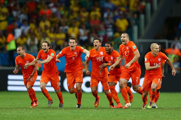 SALVADOR, BRAZIL - JULY 05: Wesley Sneijder, Daley Blind, Stefan de Vrij, Klaas-Jan Huntelaar, Jeremain Lens, Ron Vlaar and Arjen Robben of the Netherlands celebrate victory in a penalty shootout against Costa Rica during the 2014 FIFA World Cup Brazil Quarter Final match between the Netherlands and Costa Rica at Arena Fonte Nova on July 5, 2014 in Salvador, Brazil. (Photo by Michael Steele/Getty Images) SALVADOR, BRAZIL - JULY 05: Wesley Sneijder, Daley Blind, Stefan de Vrij, Klaas-Jan Huntelaar, Jeremain Lens, Ron Vlaar and Arjen Robben of the Netherlands celebrate victory in a penalty shootout against Costa Rica during the 2014 FIFA World Cup Brazil Quarter Final match between the Netherlands and Costa Rica at Arena Fonte Nova on July 5, 2014 in Salvador, Brazil. (Photo by Michael Steele/Getty Images)