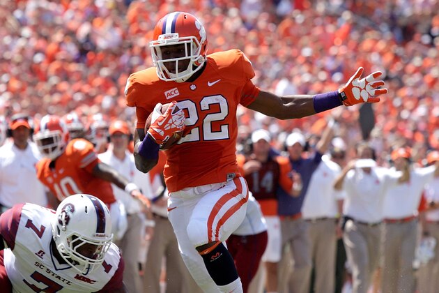 CLEMSON, SC - SEPTEMBER 7: D.J. Howard #22 of the Clemson Tigers rushes for a touchdown during the game against the South Carolina State Bulldogs at Memorial Stadium on September 7, 2013 in Clemson, South Carolina. (Photo by Tyler Smith/Getty Images)