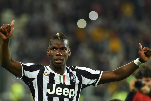 TURIN, ITALY - MAY 05:  Paul Pogba of Juventus celebrates after beating Atalanta BC 1-0 to win the Serie A Championships at the end of the Serie A match between Juventus and Atalanta BC at Juventus Arena on May 5, 2014 in Turin, Italy.  (Photo by Valerio Pennicino/Getty Images)