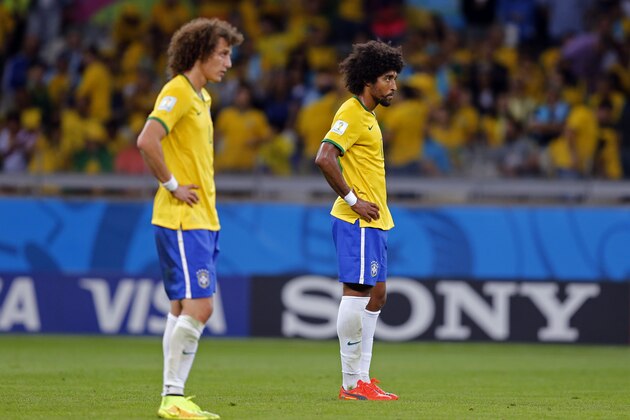 Brazil's David Luiz, left, and Dante react after Germany scored their sixth goal during the World Cup semifinal soccer match between Brazil and Germany at the Mineirao Stadium in Belo Horizonte, Brazil, Tuesday, July 8, 2014. (AP Photo/Frank Augstein) Brazil's David Luiz, left, and Dante react after Germany scored their sixth goal during the World Cup semifinal soccer match between Brazil and Germany at the Mineirao Stadium in Belo Horizonte, Brazil, Tuesday, July 8, 2014. (AP Photo/Frank Augstein)