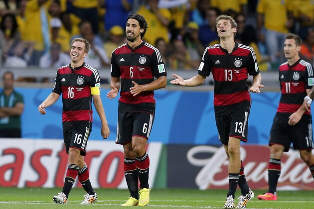 Germany's Philipp Lahm, Sami Khedira, Thomas Mueller and Miroslav Klose, from left, smile after their team scored during the World Cup semifinal soccer match between Brazil and Germany at the Mineirao Stadium in Belo Horizonte, Brazil, Tuesday, July 8, 2014. (AP Photo/Frank Augstein) Germany's Philipp Lahm, Sami Khedira, Thomas Mueller and Miroslav Klose, from left, smile after their team scored during the World Cup semifinal soccer match between Brazil and Germany at the Mineirao Stadium in Belo Horizonte, Brazil, Tuesday, July 8, 2014. (AP Photo/Frank Augstein)