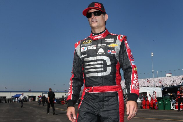 SPARTA, KY - JUNE 27:  Jeff Gordon, driver of the #24 Drive to End Hunger Chevrolet, walks in the garage area  during practice for the NASCAR Sprint Cup Series Quaker State 400 presented by Advance Auto Parts at Kentucky Speedway on June 27, 2014 in Sparta, Kentucky.  (Photo by Christian Petersen/Getty Images)