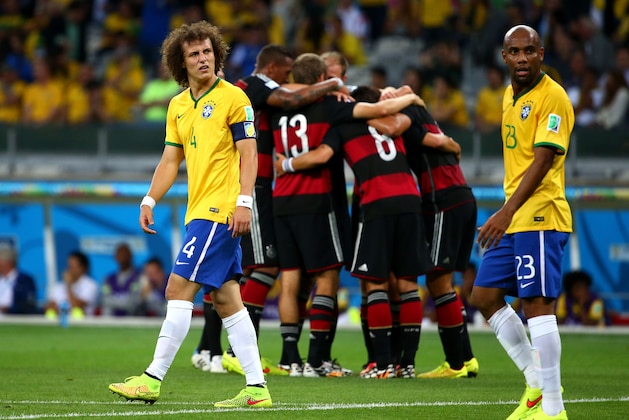 BELO HORIZONTE, BRAZIL - JULY 08:  David Luiz and Maicon of Brazil look dejected after allowing Germany's fifth goal during the 2014 FIFA World Cup Brazil Semi Final match between Brazil and Germany at Estadio Mineirao on July 8, 2014 in Belo Horizonte, Brazil.  (Photo by Robert Cianflone/Getty Images)