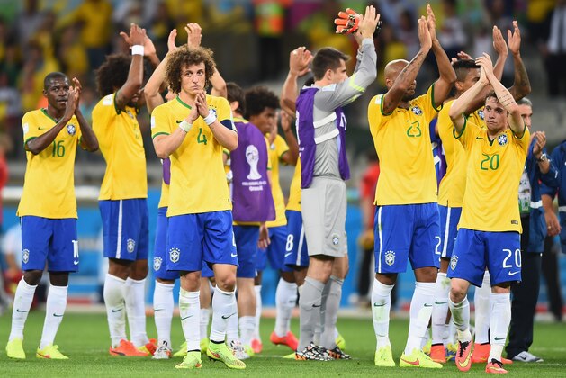 BELO HORIZONTE, BRAZIL - JULY 08:  Brazil players acknowledge the fans after a 7-1 defeat to Germany during the 2014 FIFA World Cup Brazil Semi Final match between Brazil and Germany at Estadio Mineirao on July 8, 2014 in Belo Horizonte, Brazil.  (Photo by Laurence Griffiths/Getty Images)