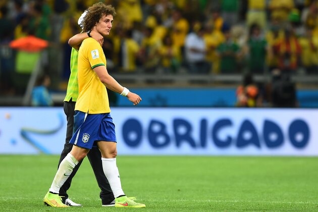BELO HORIZONTE, BRAZIL - JULY 08: Thiago Silva of Brazil consoles David Luiz after Germany's 7-1 victory during the 2014 FIFA World Cup Brazil Semi Final match between Brazil and Germany at Estadio Mineirao on July 8, 2014 in Belo Horizonte, Brazil. (Photo by Buda Mendes/Getty Images) BELO HORIZONTE, BRAZIL - JULY 08: Thiago Silva of Brazil consoles David Luiz after Germany's 7-1 victory during the 2014 FIFA World Cup Brazil Semi Final match between Brazil and Germany at Estadio Mineirao on July 8, 2014 in Belo Horizonte, Brazil. (Photo by Buda Mendes/Getty Images)