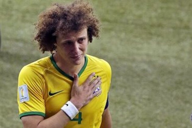 Brazil's David Luiz leaves the pitch after the World Cup semifinal soccer match between Brazil and Germany at the Mineirao Stadium in Belo Horizonte, Brazil, Tuesday, July 8, 2014. Germany won 7-1.(AP Photo/Themba Hadebe)