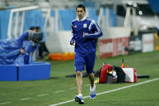 Argentina's Angel di Maria jogs during a training session one day before their World Cup semifinal soccer match against Netherlands at Itaquerao Stadium in Sao Paulo, Brazil, Tuesday, July 8, 2014. (AP Photo/Victor R. Caivano)