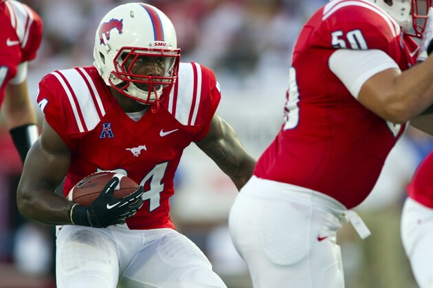 DALLAS, TX - AUGUST 30: Traylon Shead #34 of the Southern Methodist Mustangs breaks free against the Texas Tech Red Raiders on August 30, 2013 at Gerald J. Ford Stadium in Dallas, Texas.  (Photo by Cooper Neill/Getty Images)