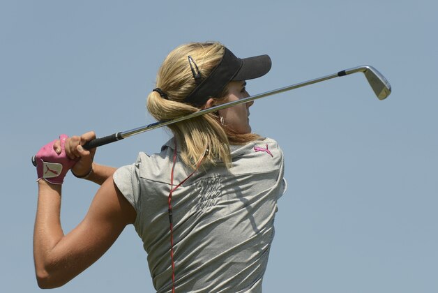 Jun 15, 2014; Pinehurst, NC, USA; LPGA player Lexi Thompson hits tee shots on the practice ground during the final round of the 2014 U.S. Open golf tournament at Pinehurst Resort Country Club - #2 Course. Mandatory Credit: Kyle Terada-USA TODAY Sports Jun 15, 2014; Pinehurst, NC, USA; LPGA player Lexi Thompson hits tee shots on the practice ground during the final round of the 2014 U.S. Open golf tournament at Pinehurst Resort Country Club - #2 Course. Mandatory Credit: Kyle Terada-USA TODAY Sports