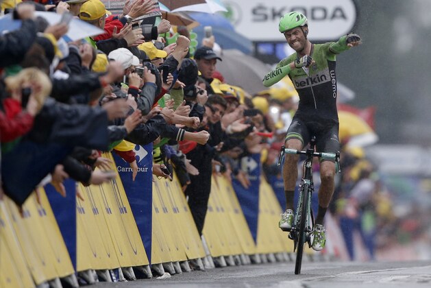 Netherland's Lars Boom celebrates as he crosses the finish line to win the fifth stage of the Tour de France cycling race over 155 kilometers (96.3 miles) with start in Ypres, Belgium, and finish in Arenberg, France, Wednesday, July 9, 2014. (AP Photo/Peter Dejong) Netherland's Lars Boom celebrates as he crosses the finish line to win the fifth stage of the Tour de France cycling race over 155 kilometers (96.3 miles) with start in Ypres, Belgium, and finish in Arenberg, France, Wednesday, July 9, 2014. (AP Photo/Peter Dejong)