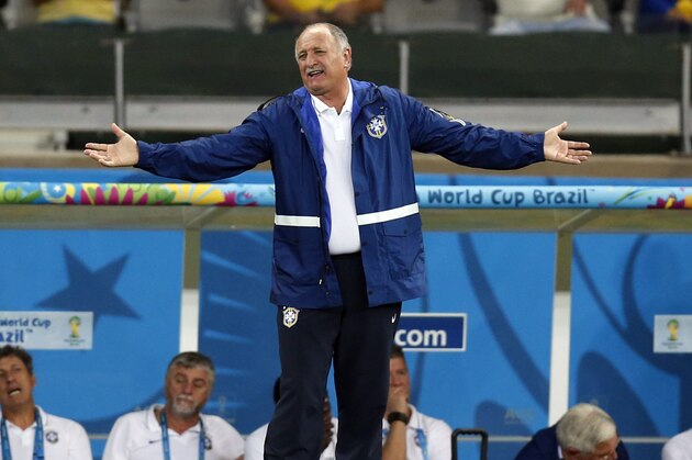 Brazil's coach Luiz Felipe Scolari spreads his arms as he watches the World Cup semifinal soccer match between Brazil and Germany at the Mineirao Stadium in Belo Horizonte, Brazil, Tuesday, July 8, 2014. (AP Photo/Frank Augstein) Brazil's coach Luiz Felipe Scolari spreads his arms as he watches the World Cup semifinal soccer match between Brazil and Germany at the Mineirao Stadium in Belo Horizonte, Brazil, Tuesday, July 8, 2014. (AP Photo/Frank Augstein)