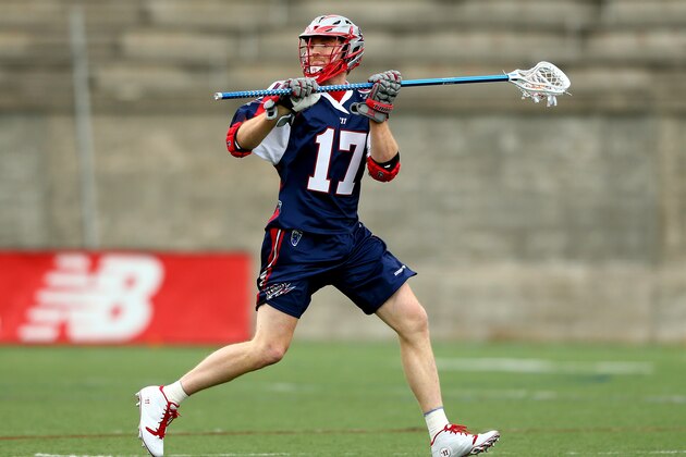 BOSTON, MA - APRIL 27: Brodie Merrill #17 of the Boston Cannons looks to pass against the Chesapeake Bayhawks during a game at Harvard Stadium on April 27, 2014 in Boston, Massachusetts.  (Photo by Alex Trautwig/Getty Images)