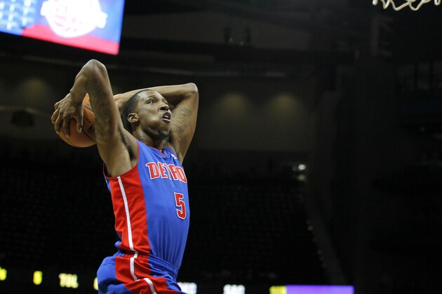 Detroit Pistons guard Kentavious Caldwell-Pope (5) goes up for the slam in the second period of an NBA basketball game against the Atlanta Hawks in Atlanta, Tuesday, April 8, 2014. (AP Photo/Todd Kirkland)