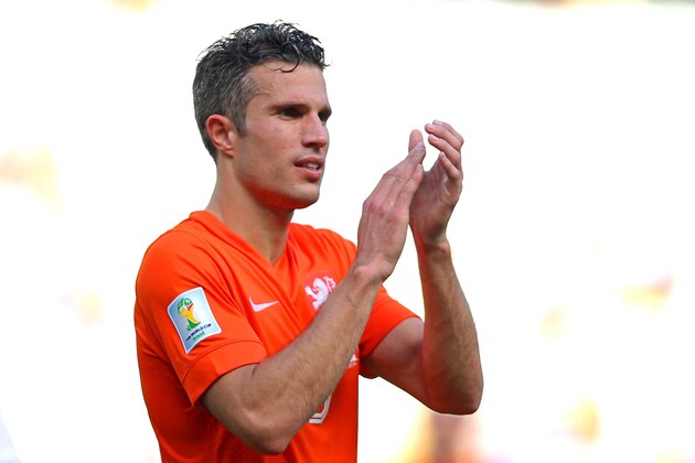 FORTALEZA, BRAZIL - JUNE 29:  Robin van Persie  of the Netherlands acknowledges the fans after defeating Mexico 2-1 during the 2014 FIFA World Cup Brazil Round of 16 match between Netherlands and Mexico at Castelao on June 29, 2014 in Fortaleza, Brazil.  (Photo by Dean Mouhtaropoulos/Getty Images)
