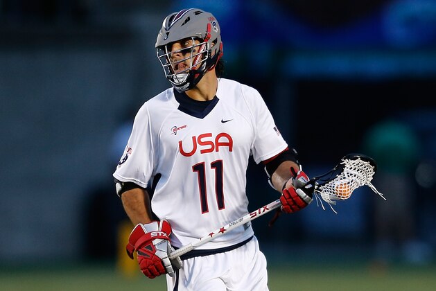BOSTON, MA - JUNE 26: Paul Rabil #11 of Team USA competes against Team MLL in the fourth quarter during the 2014 MLL All Star Game at Harvard Stadium on June 26, 2014 in Boston, Massachusetts.  (Photo by Jim Rogash/Getty Images)
