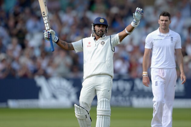 NOTTINGHAM, ENGLAND - JULY 09:  Murali Vijay of India celebrates reaching his century during day one of 1st Investec Test match between England and India at Trent Bridge on July 9, 2014 in Nottingham, England.  (Photo by Gareth Copley/Getty Images)
