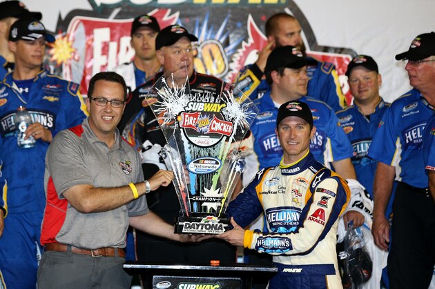 DAYTONA BEACH, FL - JULY 04:  Kasey Kahne, driver of the #5 Hellmann's Chevrolet, celebrates in Victory Lane with Jared Fogle of Subway after winning the NASCAR Nationwide Series Subway Firecracker 250 Powered by Coca-Cola at Daytona International Speedway on July 4, 2014 in Daytona Beach, Florida.  (Photo by Chris Graythen/Getty Images)